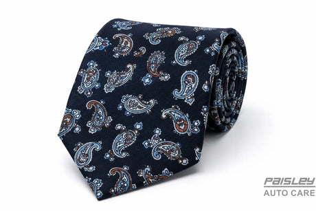 Navy blue tie with a detailed paisley design.