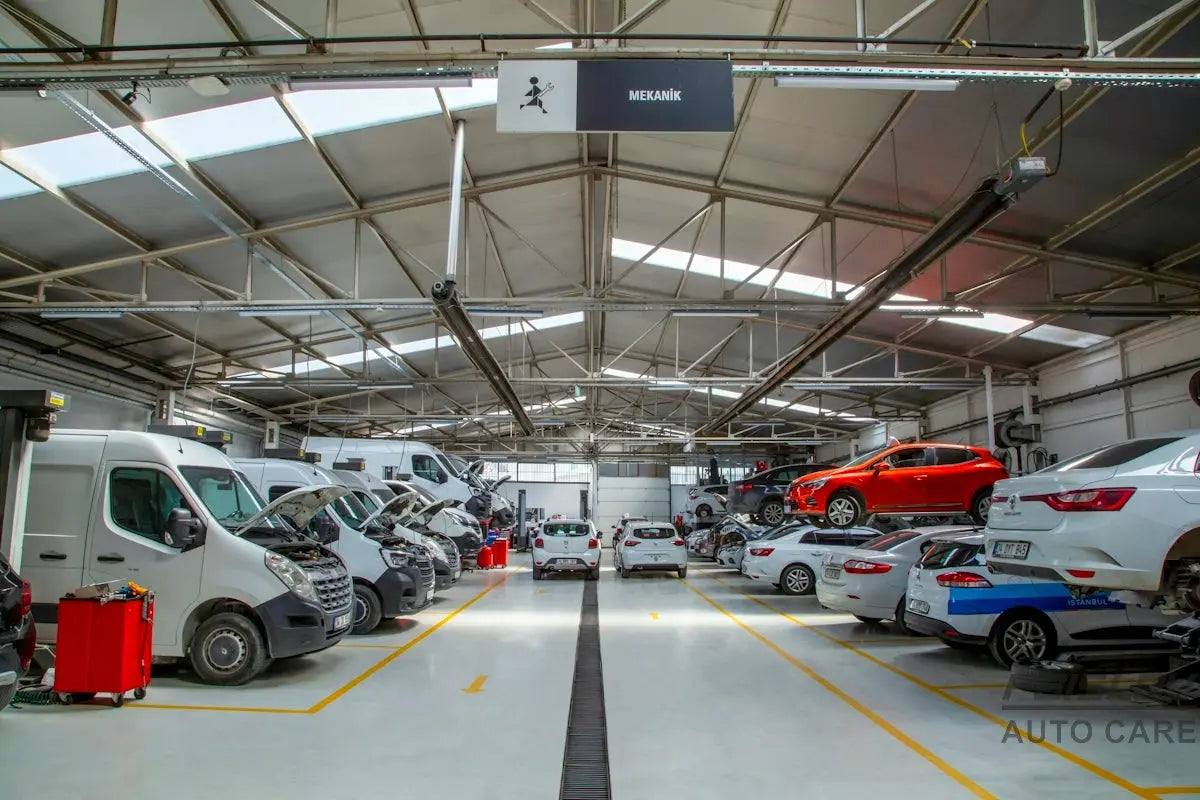 A warehouse filled with lots of cars and trucks