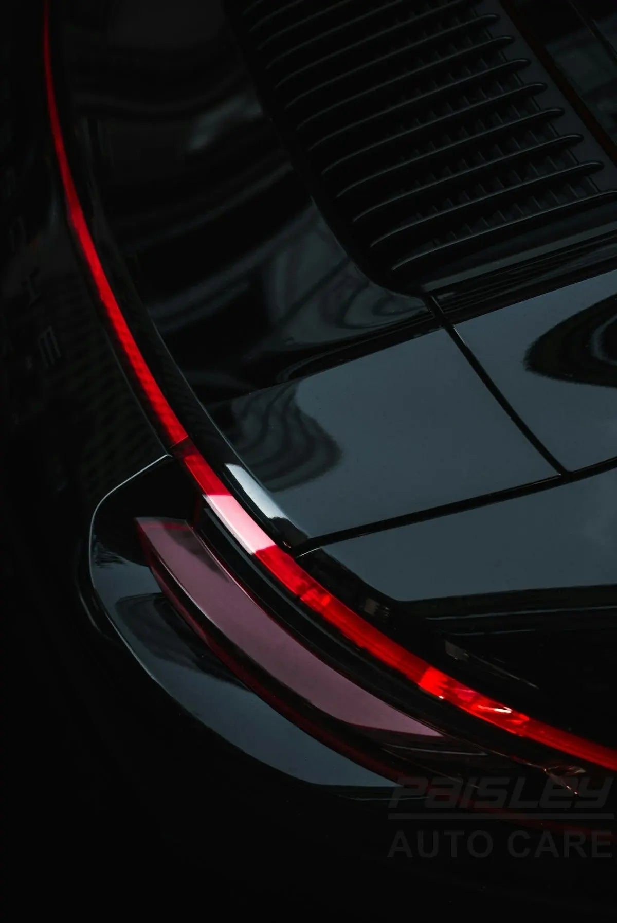 a close up of the tail lights of a car
