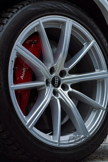 a close up of a tire on a car