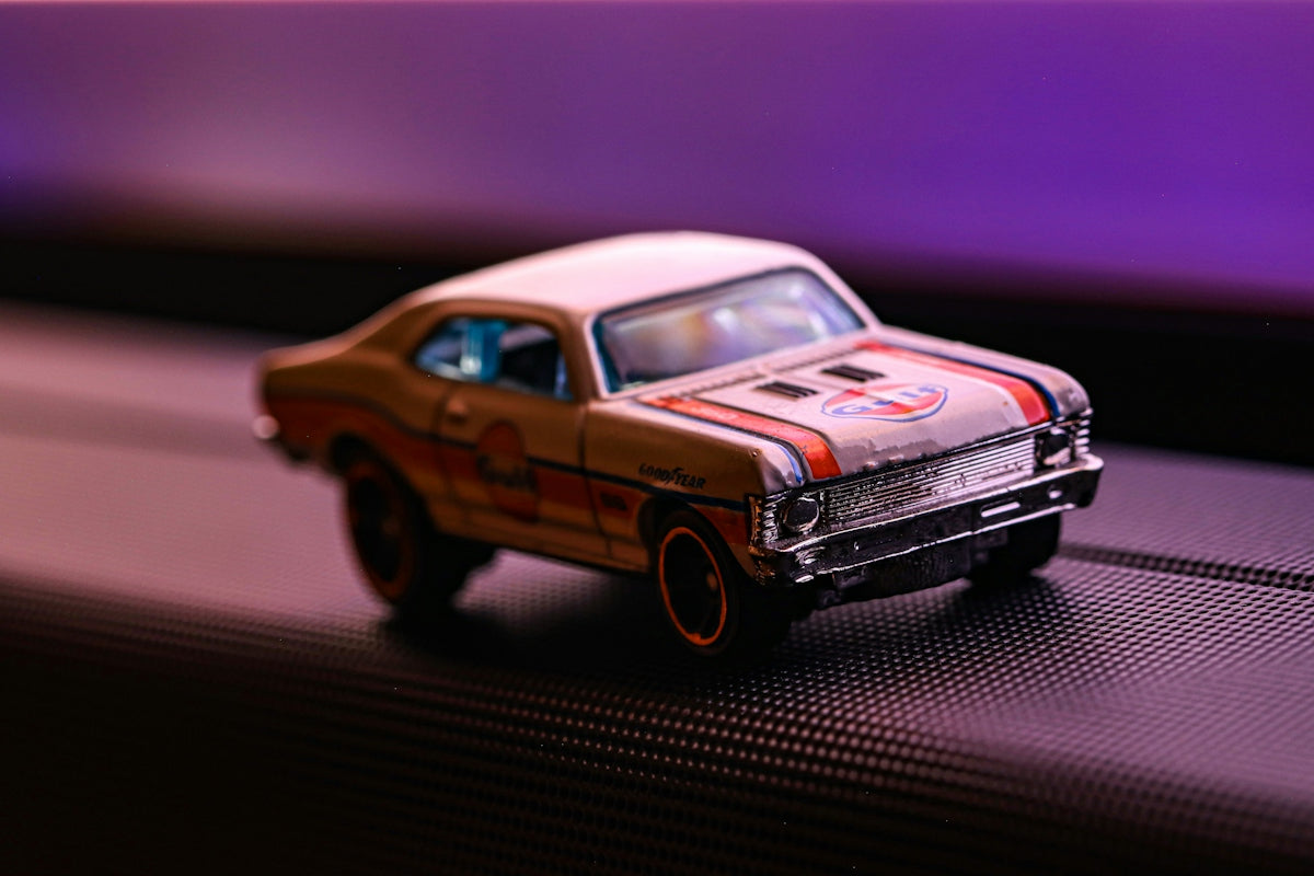 a toy car sitting on top of a table